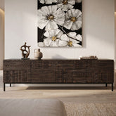 Full view of the Intaglio Credenza showcasing its modern design and natural wood finish in a contemporary living space.