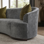 Close-up of the Allure Sofa's armrest highlighting fabric detailing and elegant height.