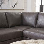 Close-up of Belmont sectional sofa corner, emphasizing stitching, fabric texture, and craftsmanship with neutral background.