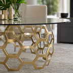 Close-up angled view of Dolma Dining Table edge, emphasizing seamless glass integration and reflective brass surfaces.