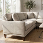Detailed view of Townsend Sectional in fabric grade Q showing textured upholstery in well-lit modern living room.