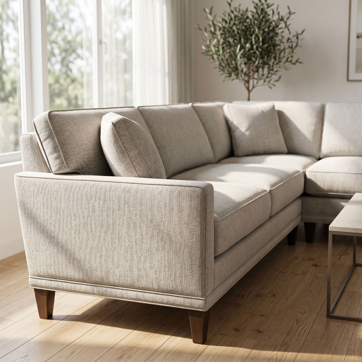Detailed view of Townsend Sectional in fabric grade Q showing textured upholstery in well-lit modern living room.