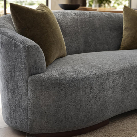 Close-up of the Allure Sofa's fabric texture emphasizing tight weave and refined material.