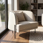 Close-up of upholstered seat and backrest of Giroud Chair highlighting clean lines and fabric texture in a modern living room.