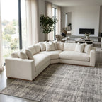 Profile view of Dominic Sectional highlighting solid wood frame and warm tones in a contemporary living room.