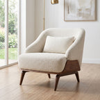Full-body view of Eva Lounge Chair placed next to a window in a contemporary living space with natural daylight.