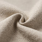 Close-up of fabric swatch showing fiber wave pattern to illustrate material texture.