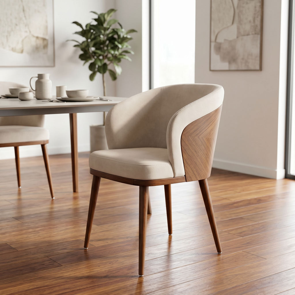 Laurent Dining Chair from a front-side angle in a minimalist dining room, highlighting fabric quality and wood finish.