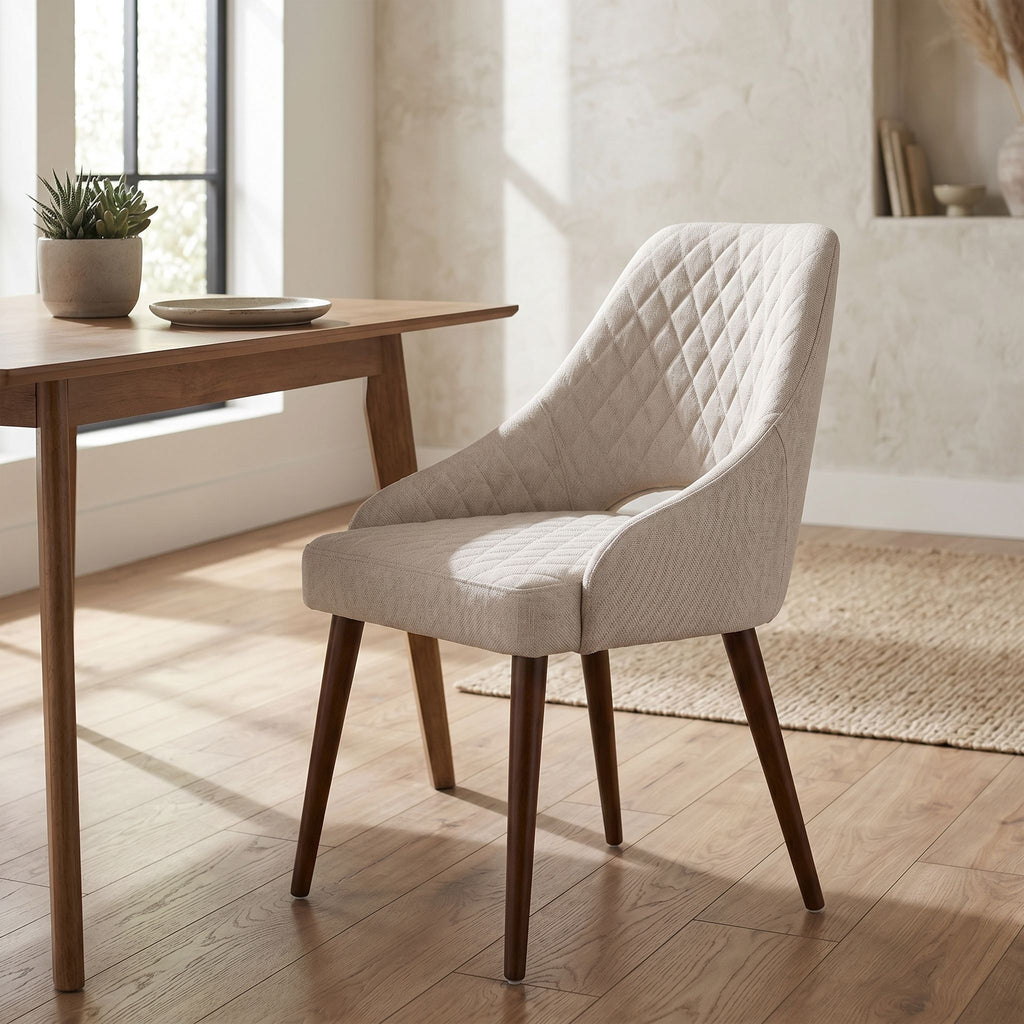 Full view of the Herchel Dining Chair in a warm, modern dining area with wooden flooring and natural sunlight.