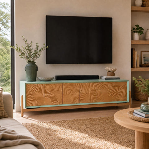 Full view of Foglia Credenza in a sunlit living room showcasing its organic shape, coastal style, and practical media storage.