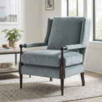 Full-body view of Hoyt Chair-484 in a modern living room showing its proportions, customizable fabric, and spring support system.