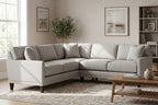 Full scene of Townsend Sectional in a chic living room highlighting its size, craftsmanship, and plush cushions with neutral decor.