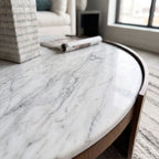 Close-up of Heba Coffee Table's marble surface highlighting veining and organic patterns.