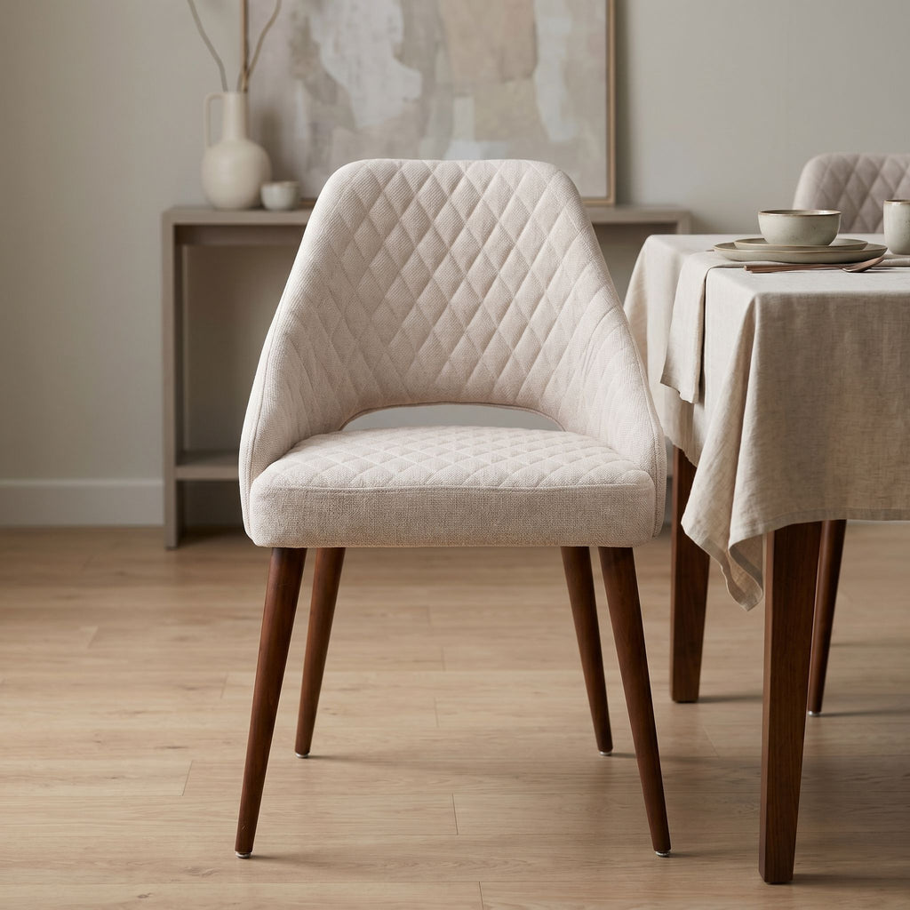 Front view of the Herchel Dining Chair in an elegant dining room emphasizing its craftsmanship and transitional style.