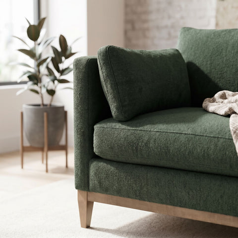 Close-up of Leo Sectional showing plush cushioning and fine stitching in a modern living room.