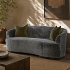 Side view of the Allure Sofa showcasing craftsmanship and proportions against neutral wall.