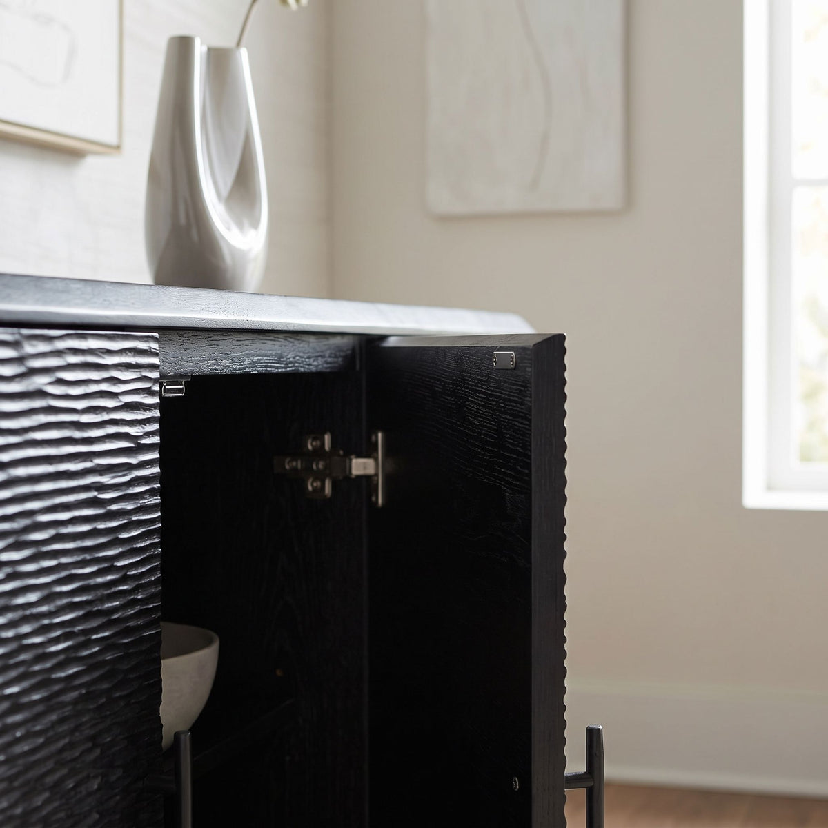 Close-up of the soft-close mechanism and edges of the Silvanos Sideboard, emphasizing craftsmanship in natural light.