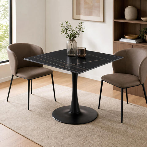 Full view of Valli square dining table in a spacious modern dining room showcasing stability and sleek design.